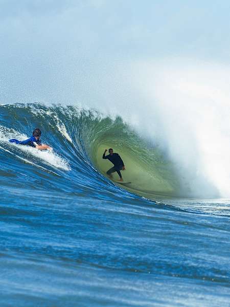 Image of Australian surfer Josh Fuller riding a tube at Burleigh Heads on the Gold Coast.