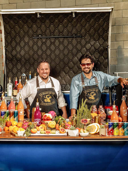 Snake Oil CEO Michael Esposito (left) and director of mixology Frankie Thaheld are ready to serve you.