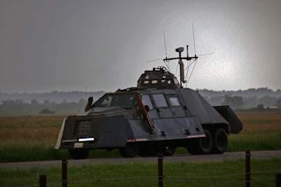 Roman P. Nagle's TIV on the road during a storm.