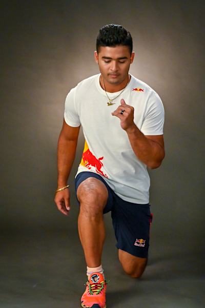 Indian cricket all-rounder Riyan Parag performs warm-up exercises to be done before a cricket match