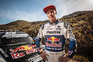 Mike Whiddett poses for a portrait on Franschhoek Pass, Cape Town, South Africa, during his Conquer The Cape project.