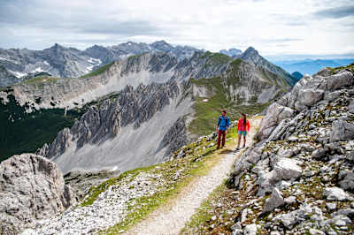 A couple hike in the Karwendel mountains in Innsbruck.