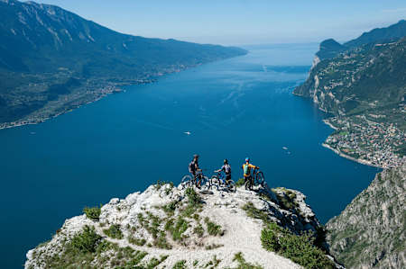 Eleonara Farina, Mirco Montagni and Marco Giacomello enjoy the view at Lake Garda, Italy on June 15, 2018.