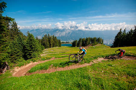 Stefan Eberharter and Tom Öhler riding at BikePark Innsbruck, Austria, July 10, 2019.