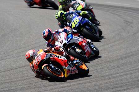 A photo of Marc Márquez leading the pack in the 2018 German MotoGP.