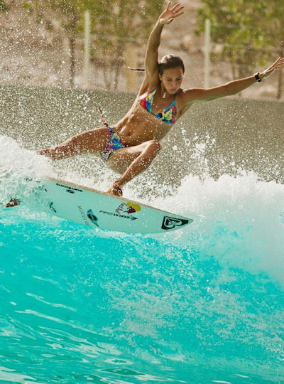 Australian surfer Sally Fitzgibbons surfing at the Wadi Adventure Wave Pool in Dubai.