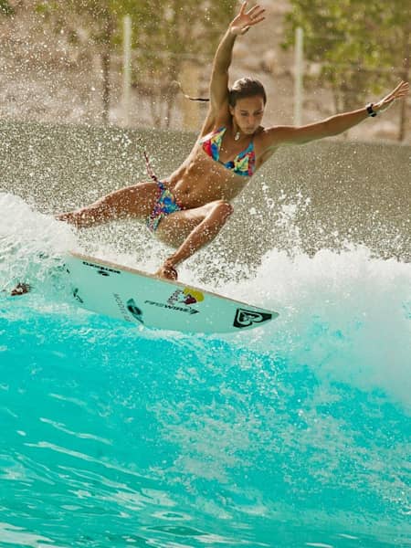 Australian surfer Sally Fitzgibbons surfing at the Wadi Adventure Wave Pool in Dubai.