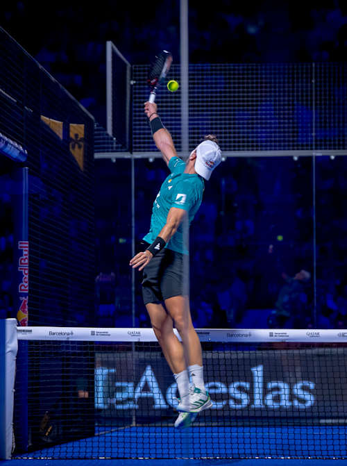 Alejandro Galán leaps for a powerful serve during the Final Premier Padel 2025 in Barcelona, Spain, thrilling fans at this high-energy championship match