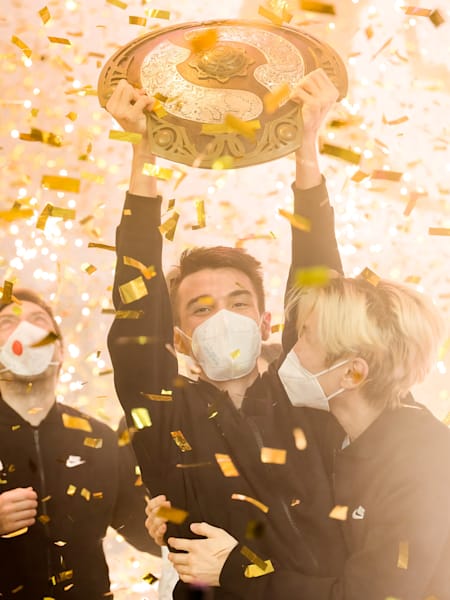 Team Spirit lifts the Aegis of Champions at The International 2021.