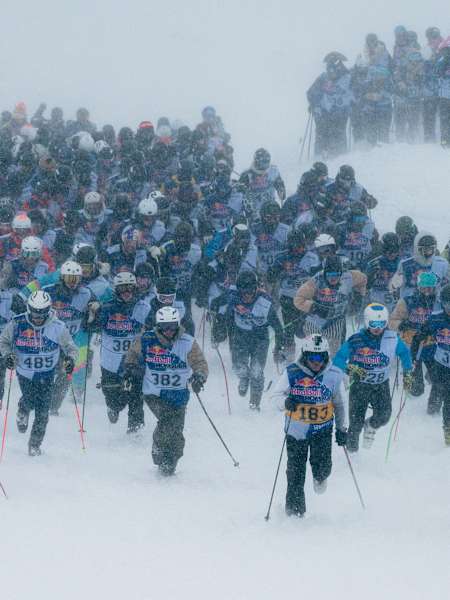 Competitors dash from the snowy start line at Red Bull Homerun 2026 in Åre, Sweden, capturing the high-energy spirit and competitive adrenaline of this unique Red Bull winter event