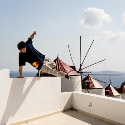 Freerunner Krystian Kowalewski performs on a rooftop on the isalnd of Astypalea, Greece.