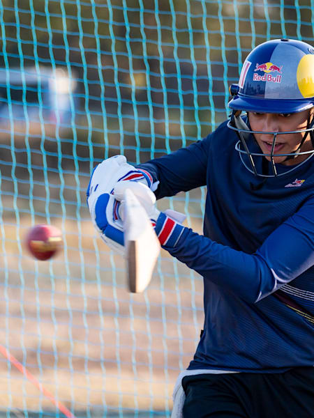Indian women's opening batter Smriti Mandhana plays a shot during a net training session.