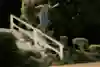 Giovanni Vianna stands tall over eleven full stairs on a Frontside Tailslide down an Argentinian banister
