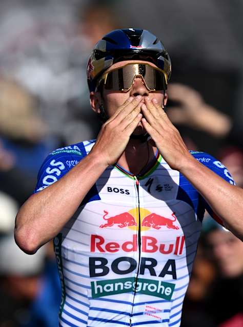 Remco Evenepoel celebrates his 2026 Grand Prix Cycliste de Quebec victory at the finish line in Quebec City.