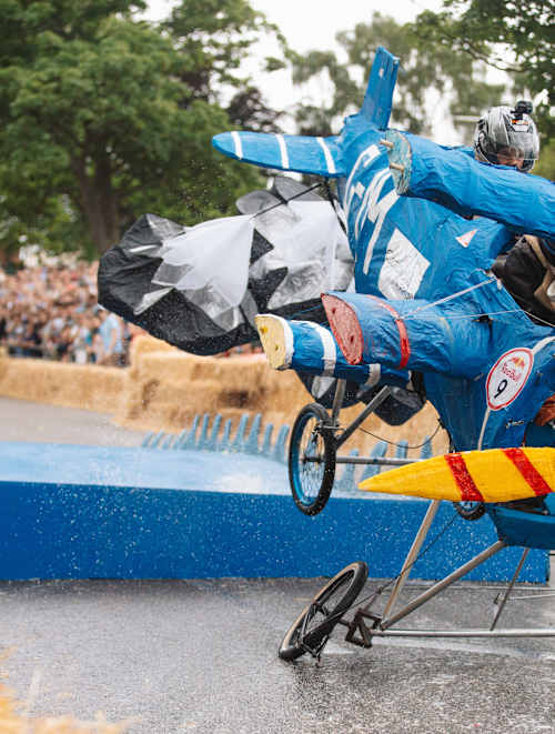 Mighty Magnificent Men take flight in their creative soapbox at the Red Bull Soapbox Race 2019, Alexandra Palace, London, thrilling the crowd with an epic crash landing