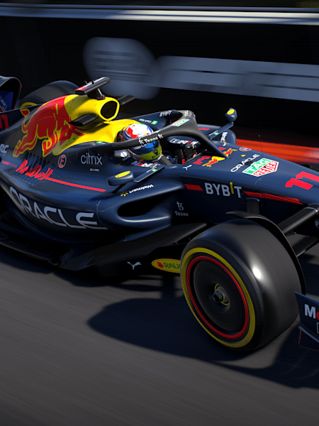 An in-game screenshot of Sergio Perez’s RB18 hurtling through the Miami International Autodrome