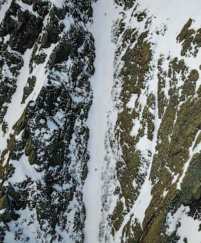 The crew of The Sky Piercer free skiing film climbing a couloir in the Mount Cook range, New Zealand.