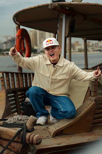 Street dance sensation MT Pop is seen striking a dynamic pose on a boat in Dubai, United Arab Emirates, on February 12, 2025