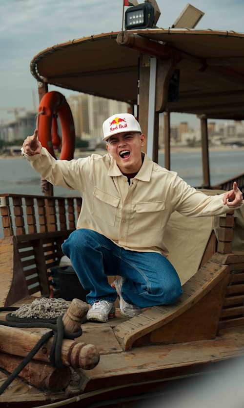 Street dance sensation MT Pop is seen striking a dynamic pose on a boat in Dubai, United Arab Emirates, on February 12, 2025