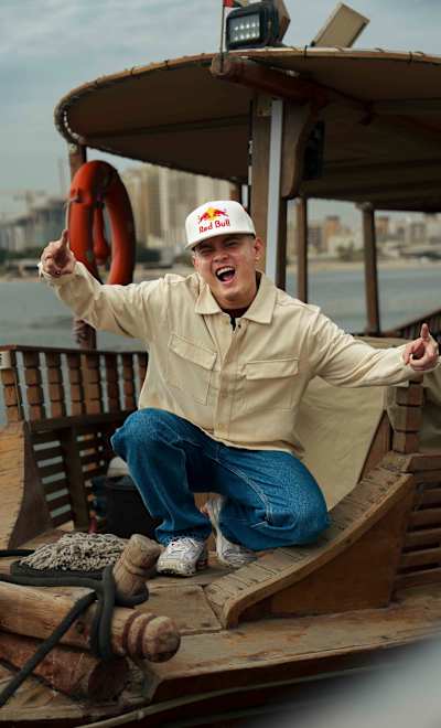 Street dance sensation MT Pop is seen striking a dynamic pose on a boat in Dubai, United Arab Emirates, on February 12, 2025