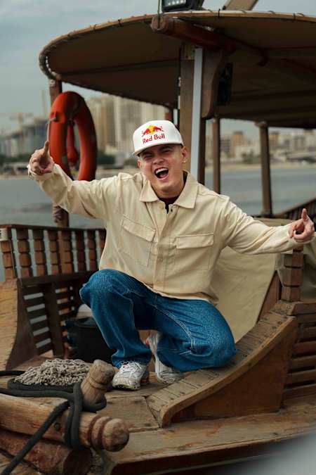 Street dance sensation MT Pop is seen striking a dynamic pose on a boat in Dubai, United Arab Emirates, on February 12, 2025