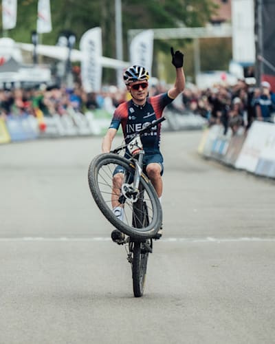 Tom Pidcock as seen wheeling across the finish line at the 2022 Albstadt XCO World Cup in Germany.