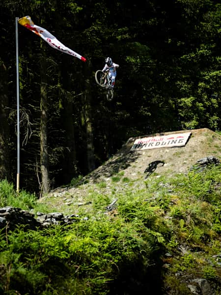Taylor Vernon jumping the 90 foot gaps at Red Bull Hardline in Dinas Mawddwy, United Kingdom on June 2, 2024.