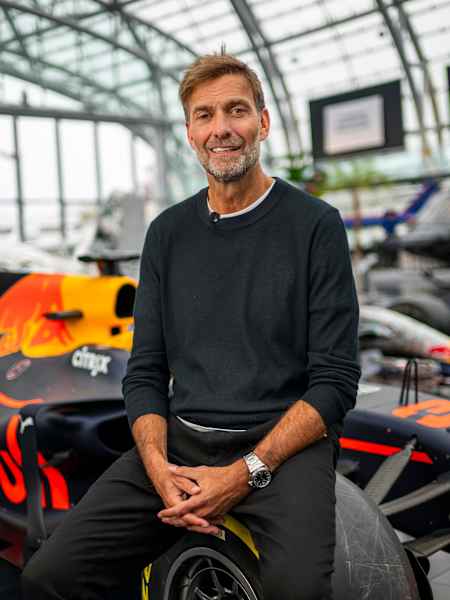 Jürgen Klopp, Red Bull's Head of Global Soccer sits on a Red Bull F1 car in Salzburg, Austria on January 7, 2025.