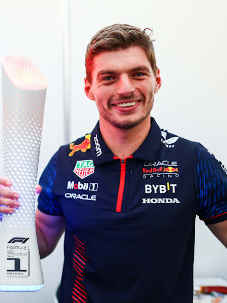Race winner Max Verstappen of the Netherlands and Oracle Red Bull Racing poses with the trophy in Suzuka, Japan.