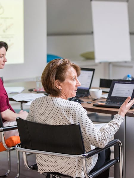 Rosi Lederer talking to colleagues during an annual Wings for Life meeting in Salzburg.