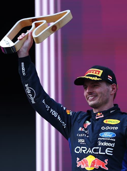Second placed Max Verstappen of the Netherlands and Oracle Red Bull Racing lifts his trophy on the podium during the F1 Grand Prix of Austria at Red Bull Ring. 