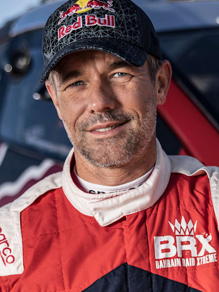Portrait de Sébastien Loeb du Bahrain Raid Xtreme lors d'essais pour le Rallye Dakar 2023, à à Merzougha, au Maroc, en octobre 2022.
