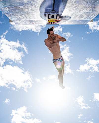 Aidan Heslop performs a breathtaking dive from a 27m platform at the 2024 Red Bull Cliff Diving World Series, Oslo, Norway.