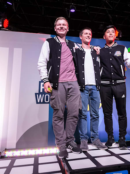 Sebastian Weyer (left), Feliks Zemdegs (centre), Bill Wang (right) in Boston at the Red Bull Rubik's Cube World Championship.