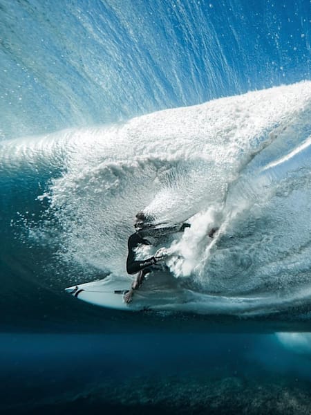 Ben Thouard, France, shows the power of surfing with this underwater shot of Ace Buchan kicking out from the barrel through the wave in Teahupo’o, Tahiti, French Polynesia.