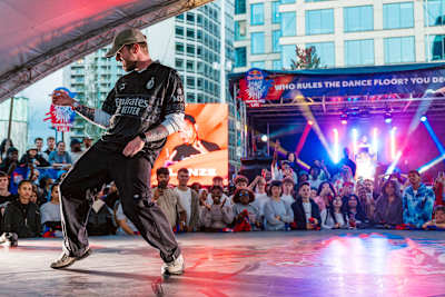 Winner Toby brings at the Red Bull Dance Your Style UK 2025 final at Centenary Square, Birmingham, thrilling the crowd with his dynamic performance under vibrant stage lights
