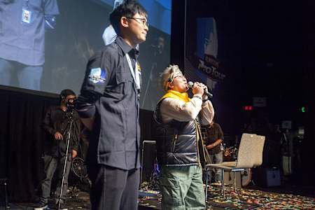 Series producer Yoshinori Ono gathers the crowd