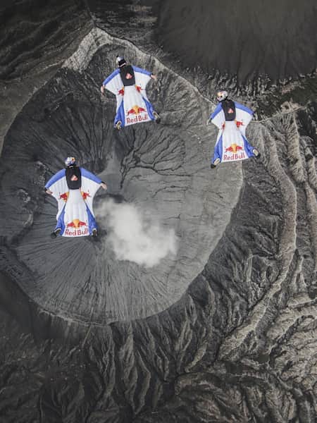 The team above a smoking volcano 
