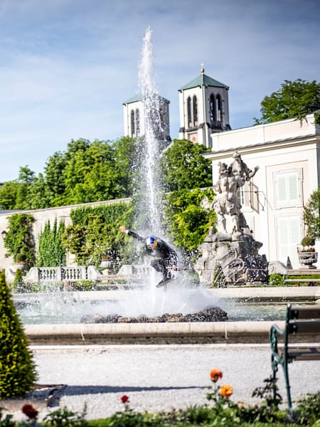 Wakeboarder Dominik Hernler performs in a fountain at the Mirabell Palace in Salzburg, Austria during filming of his video Sound of Wake.