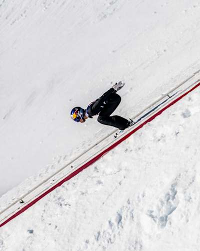 Ryoyu Kobayashi of Japan showcases exceptional skill on the snowy slopes of Akureyri, Iceland, during a thrilling event on April 24, 2024