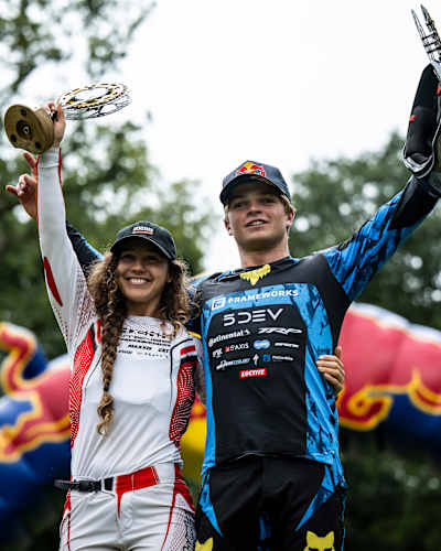 Asa Vermette and Louise Ferguson celebrate their 2025 victories at Red Bull Hardline in Dyfi Valley, Wales.