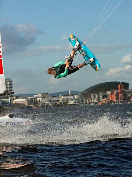 Ruben Lenten performs next to Roman Hagara and Hans Peter Steinacher prior to the Extreme Sailing Series 2012 in Cardiff Bay, United Kingdom on August 30th 2012