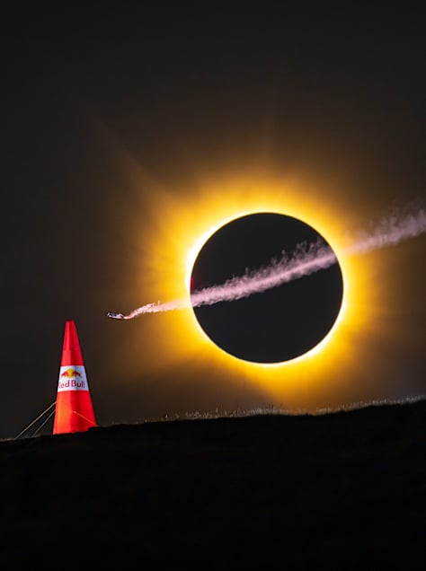 Mike Brewer flies beneath a total solar eclipse in Spain