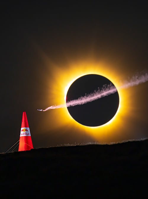 Mike Brewer flies beneath a total solar eclipse in Spain