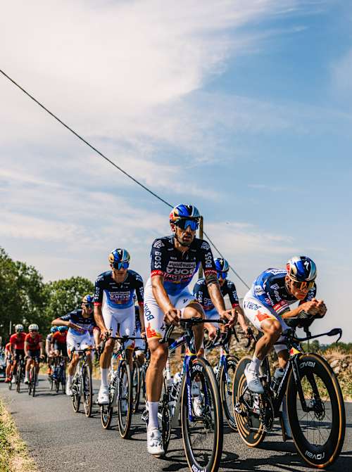 Red Bull – BORA – hansgrohe cyclists are seen in action during the first Rest Day of the 113th Tour de France. 