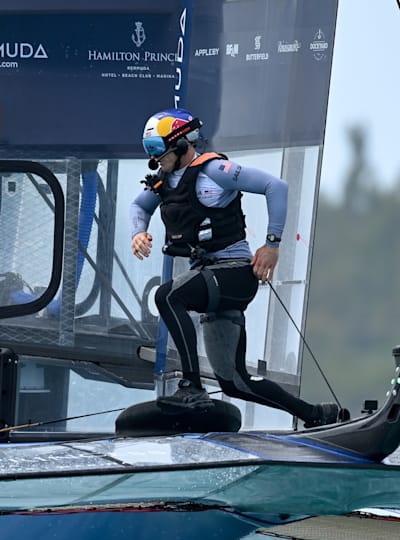 Jimmy Spithill, CEO and helm of the USA SailGP Team, runs across the catamaran during a practice race ahead of the SailGP regatta in Bermuda in May 2022.