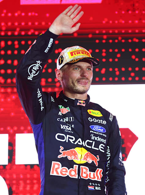 Race winner Max Verstappen of Oracle Red Bull Racing celebrates on the podium during the F1 Grand Prix of Singapore at Marina Bay Street Circuit. 