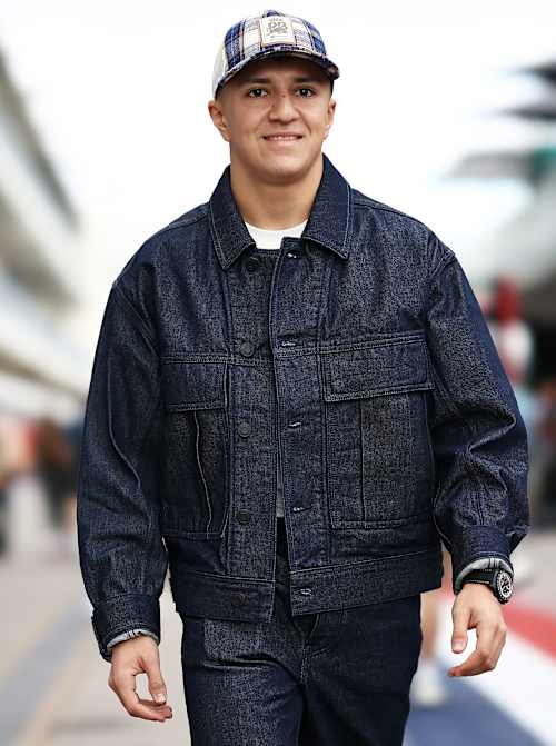 Isack Hadjar of France and Visa Cash App Racing Bulls walks in the Paddock prior to practice ahead of the F1 Grand Prix of United States at Circuit of The Americas on October 17, 2025.