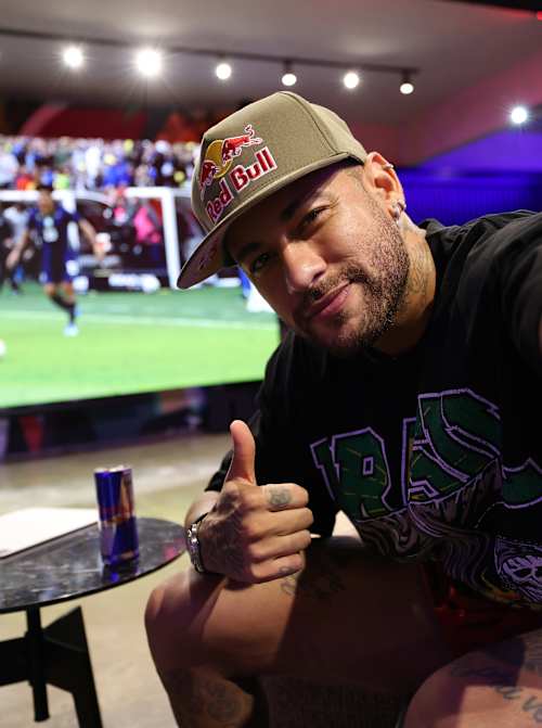 Neymar Jr gives is pictured relaxing at home in Santos, Brazil. 