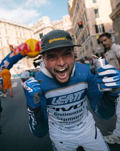 Roger Vieira pumps up the crowd at Red Bull Cerro Abajo, held at Teatro Nazionale Genova, Italy on August 24, 2025, energetically showcasing his racing spirit in Red Bull's dynamic event